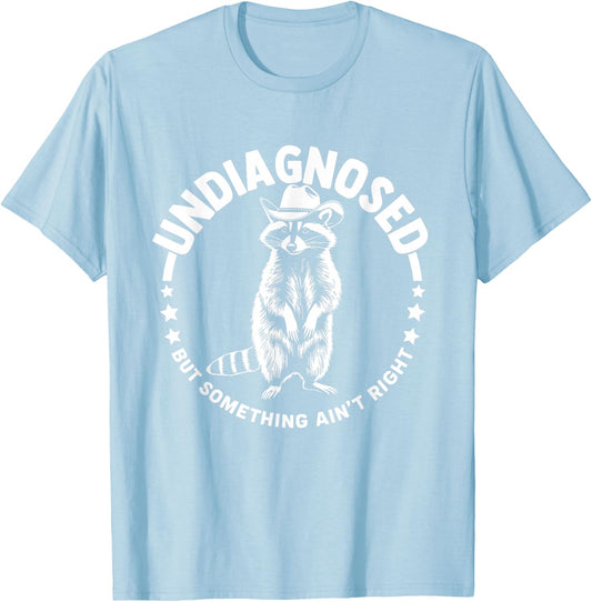 Undiagnosed But Something Ain't Right Funny Western Raccoon T-Shirt - T-Shirt | Light Blue