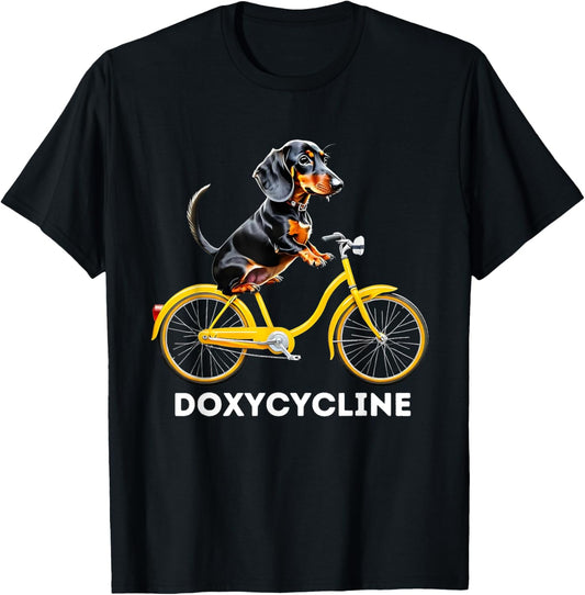 Dachshund on Bicycle Doxycycline Pharmacy Pun Dog Pharmacist T-Shirt - T-Shirt | Black